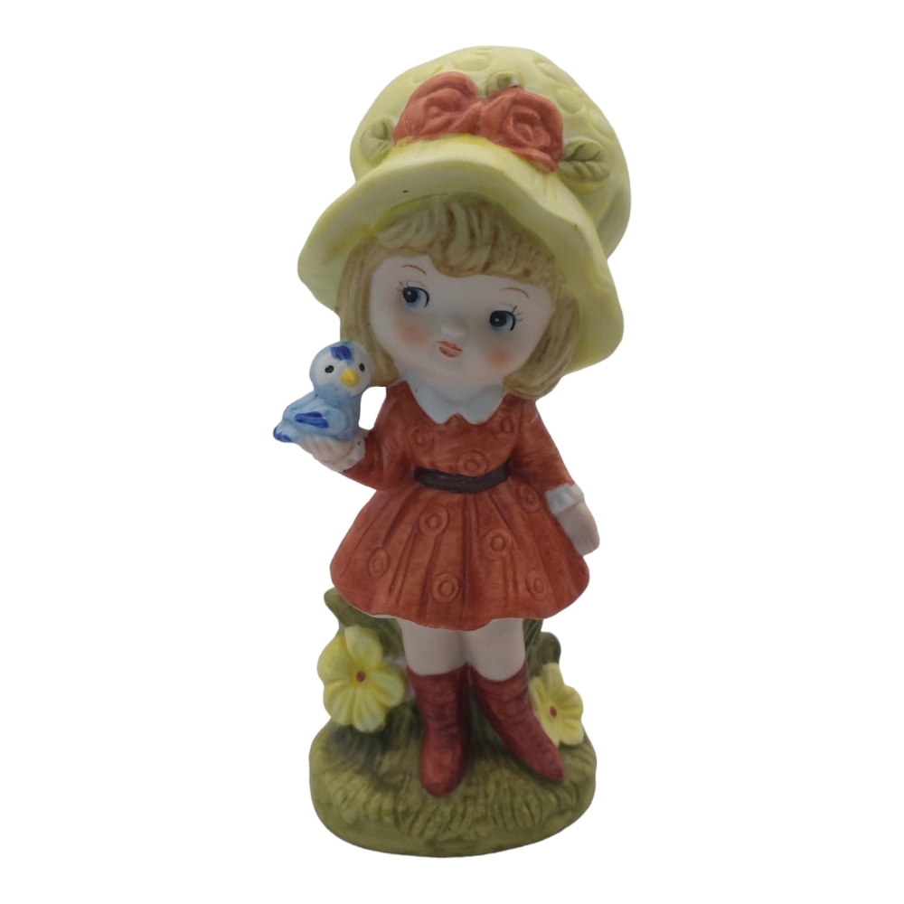 Figurine Blonde Hair Girl Holding Blue Bird
